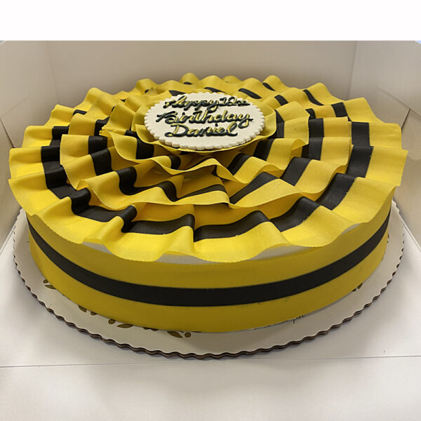 Ribbon mousse cake in black and yellow