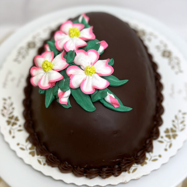 Chocolate Buttercream egg cake with dogwood floral design