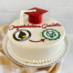 Graduation cake with white fondant and 2 scanned images