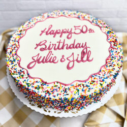 Multi colored sprinkles with standard border cake