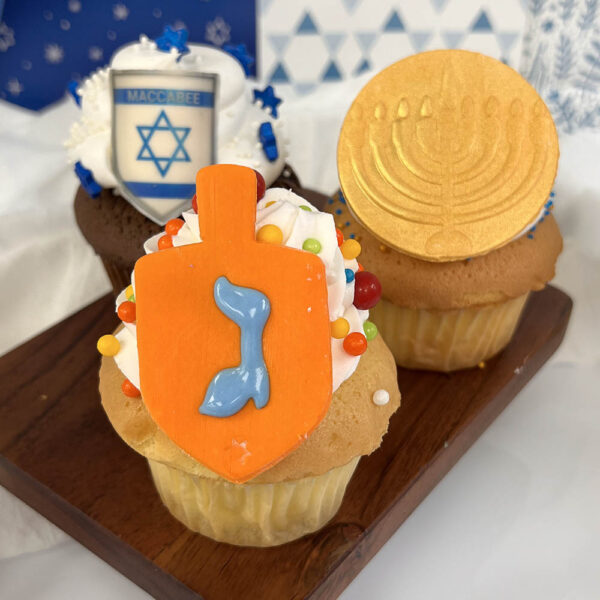 Decorated Chanukah cupcakes with Menorah, Megan David & Dreidel designs