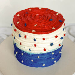 Patriotic red white and blue ombre smash cake with stars