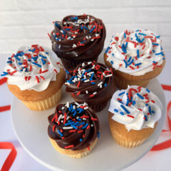Patriotic cupcakes with red, white and blue sprinkles